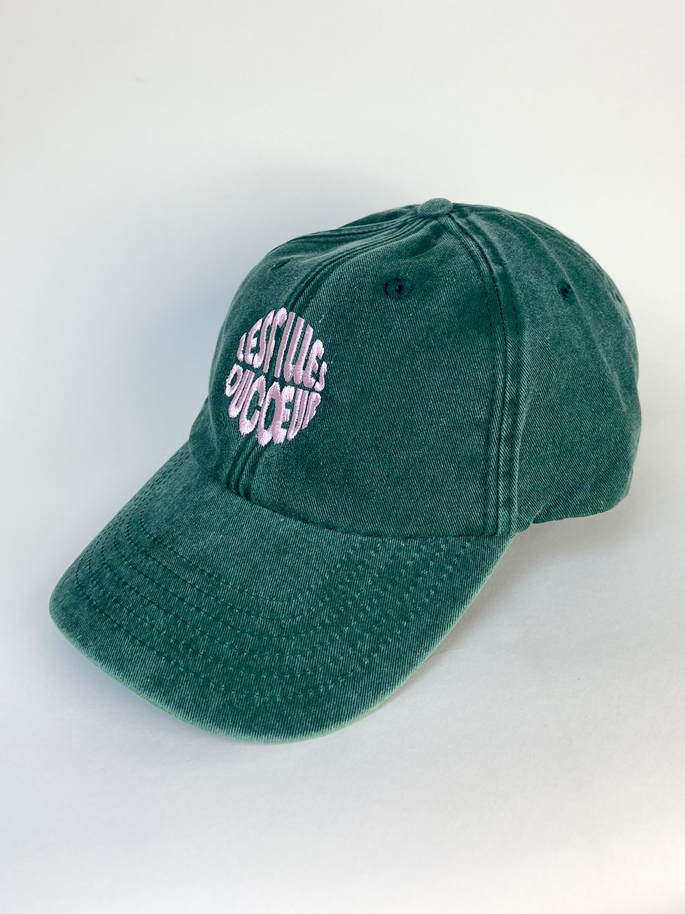 Embroidered shield cap bottle green - pink